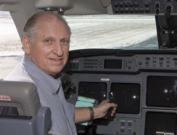 Photo of Henry Boynton in cockpit of plane