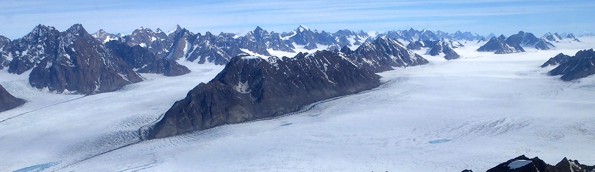 Birdseye view of the Greenland ice sheet with ridges of rock