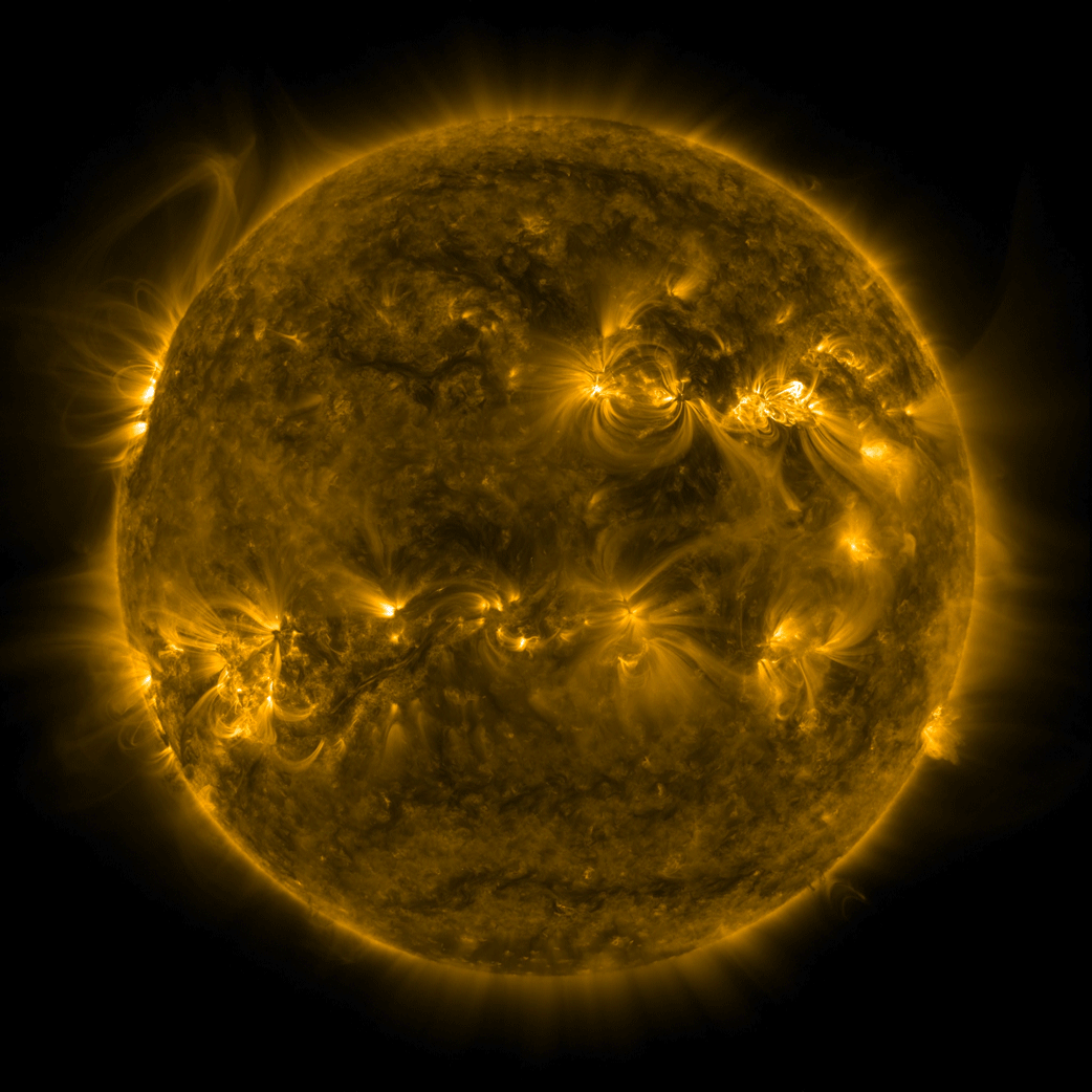 Image of the Sun in ultraviolet light, which shows the hottest areas. A solar flare erupt from one of the bright, hot areas in the upper right.