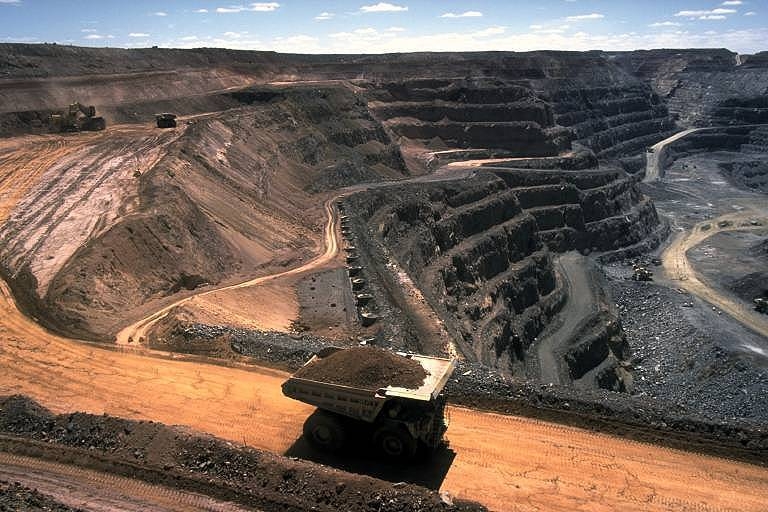 Coal strip mine and truck carrying dirt