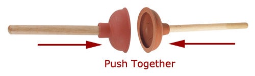 Two plungers pushing together with suction cups facing each other