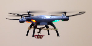 UAV delivering payload - skyhook with basket.