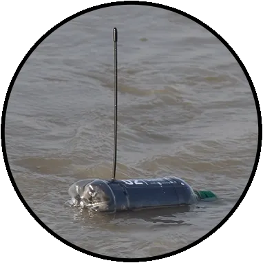 Photo of a plastic bottle fitted with a radio-transmitter, floating in the Ganges River.