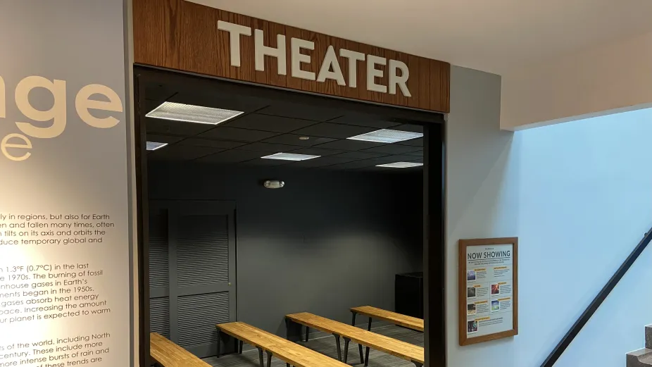 Doorway to enter the Theater with the name above it.