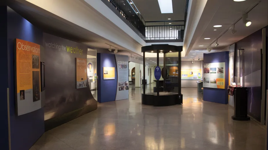 The hallway for the Weather Exhibit showing the tornado machine in the middle.