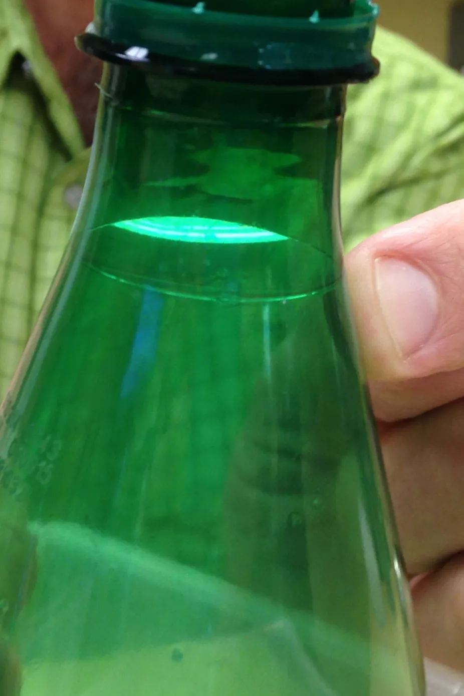 Bubble inside the neck of a plastic bottle