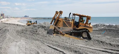 Bulldozing sand after Hurricane Sandy on Rockaway Beach, 2013