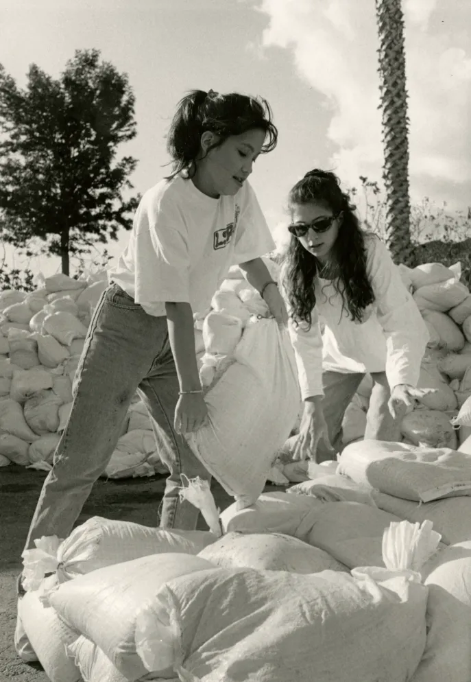 Preparing for floods piling sandbags in Malibu, California