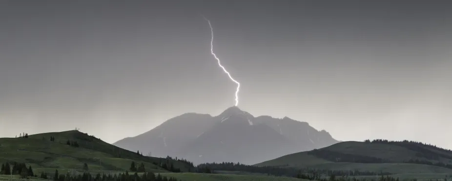 Lightning striking a mountaintop