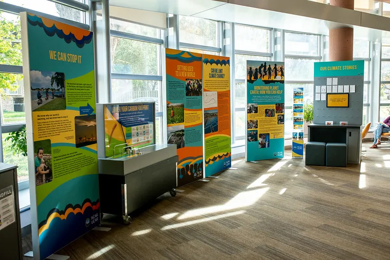 Multiple exhibit panels from Real People, Real Climate, Real Changes traveling exhibit set up at a library in Boulder, Colorado