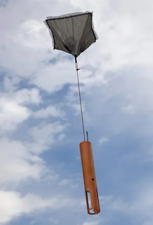 Dropsonde beneath parachute