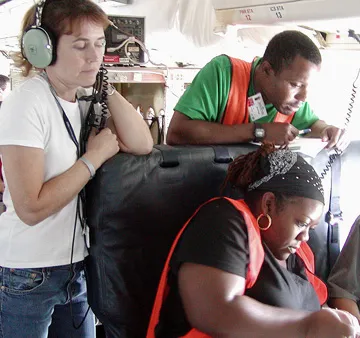 Photograph of students on a research airplane