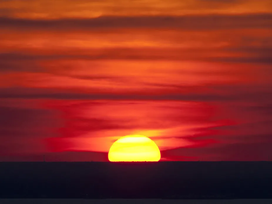 Red skies during sunset over Kennedy Space Center