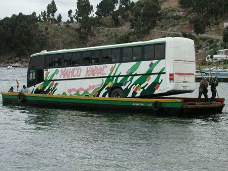 Photo of bus on a barge on a lake