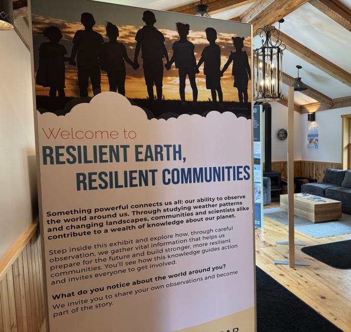 Welcome to Resilient Earth, Resilient Communities panel on display at a host location