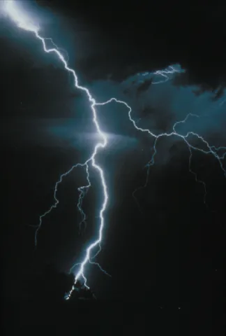 A bolt of lightning across a dark sky