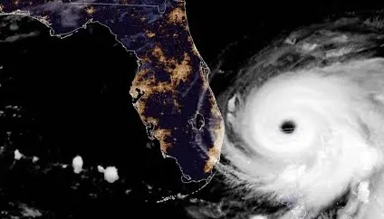 A satellite photo showing a hurricane just off the eastern coast of Florida, USA.